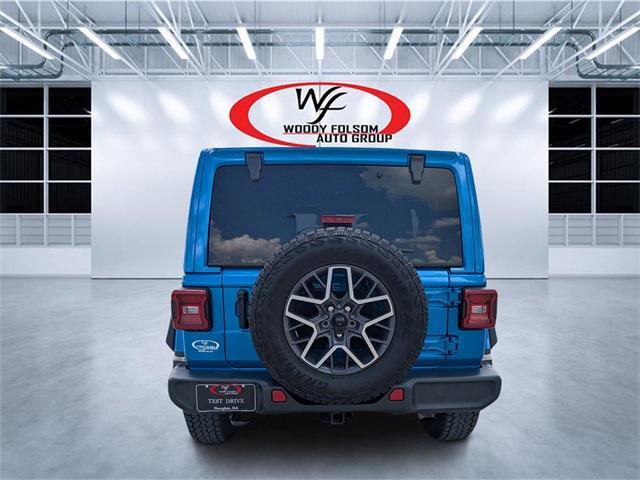 used 2024 Jeep Wrangler car, priced at $42,002