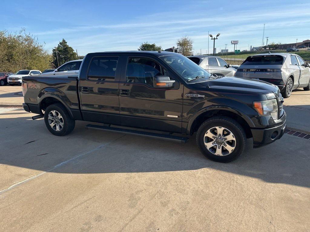used 2014 Ford F-150 car, priced at $15,000