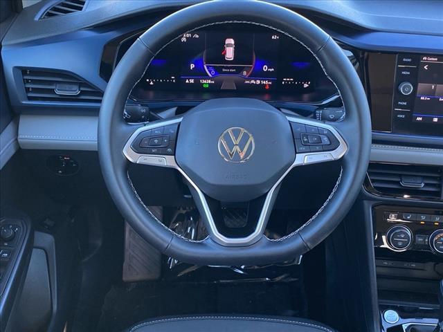 used 2024 Volkswagen Taos car, priced at $23,300