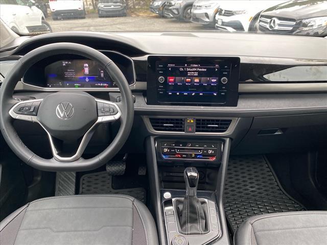 used 2025 Volkswagen Taos car, priced at $25,900