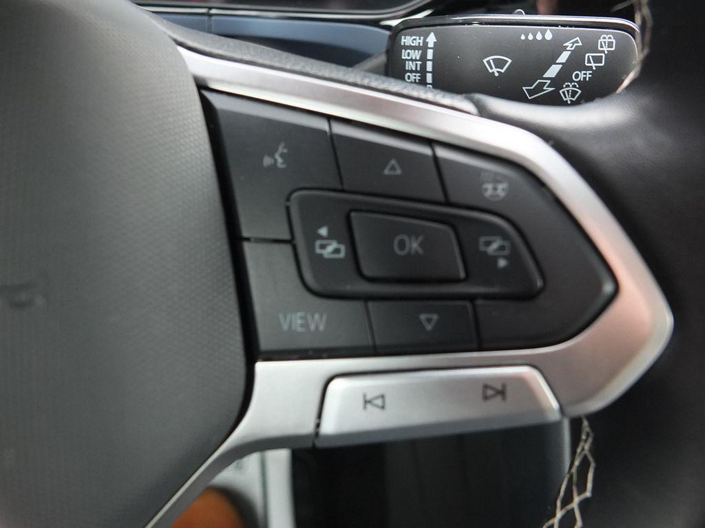 used 2024 Volkswagen Taos car, priced at $21,996