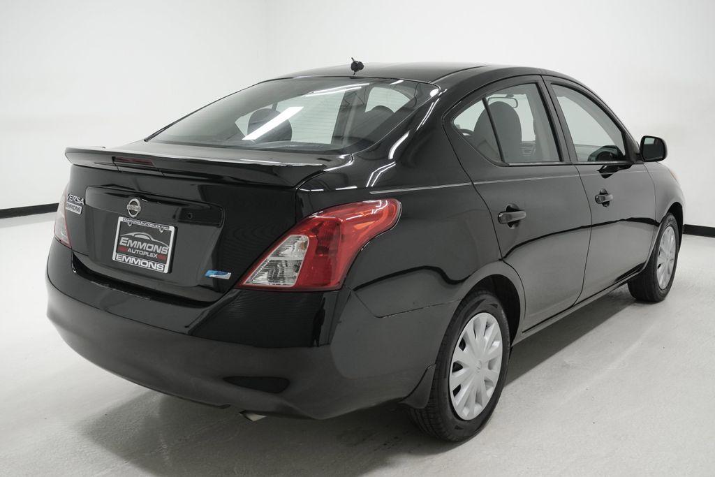 used 2014 Nissan Versa car, priced at $4,999