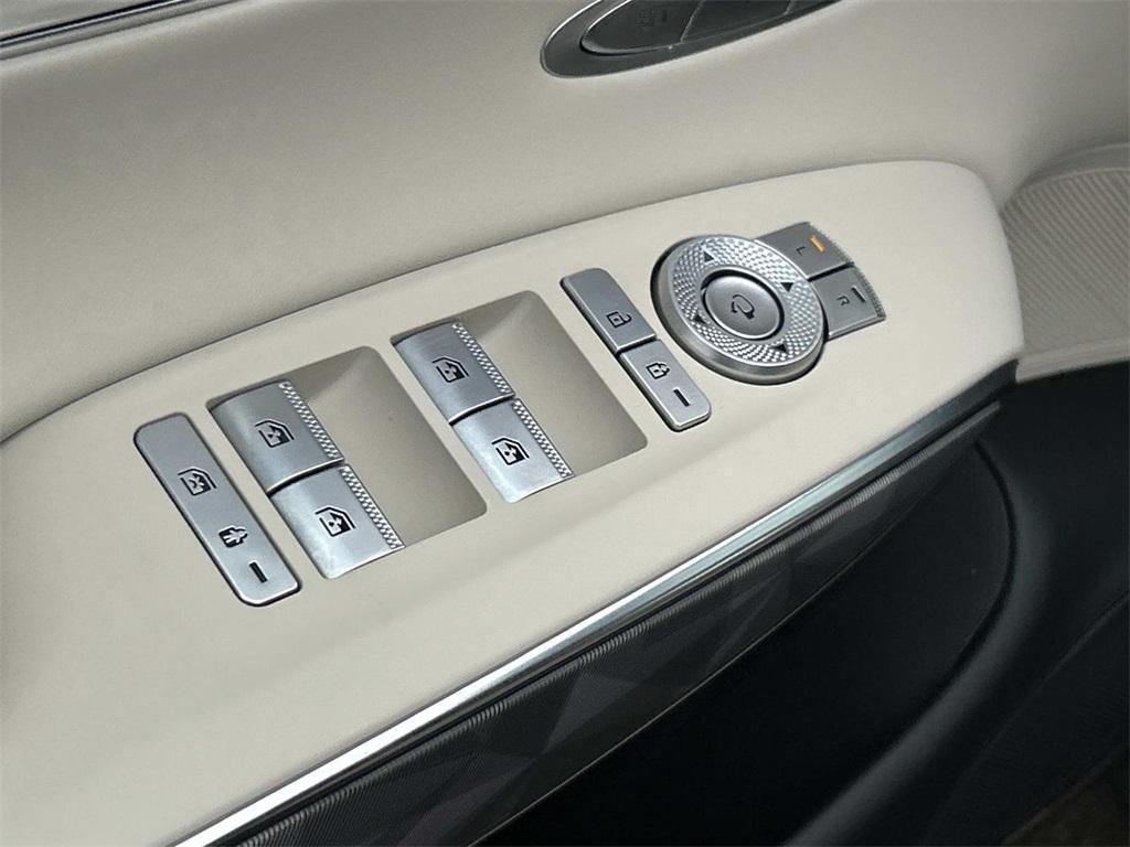 used 2023 Genesis GV70 car, priced at $46,902