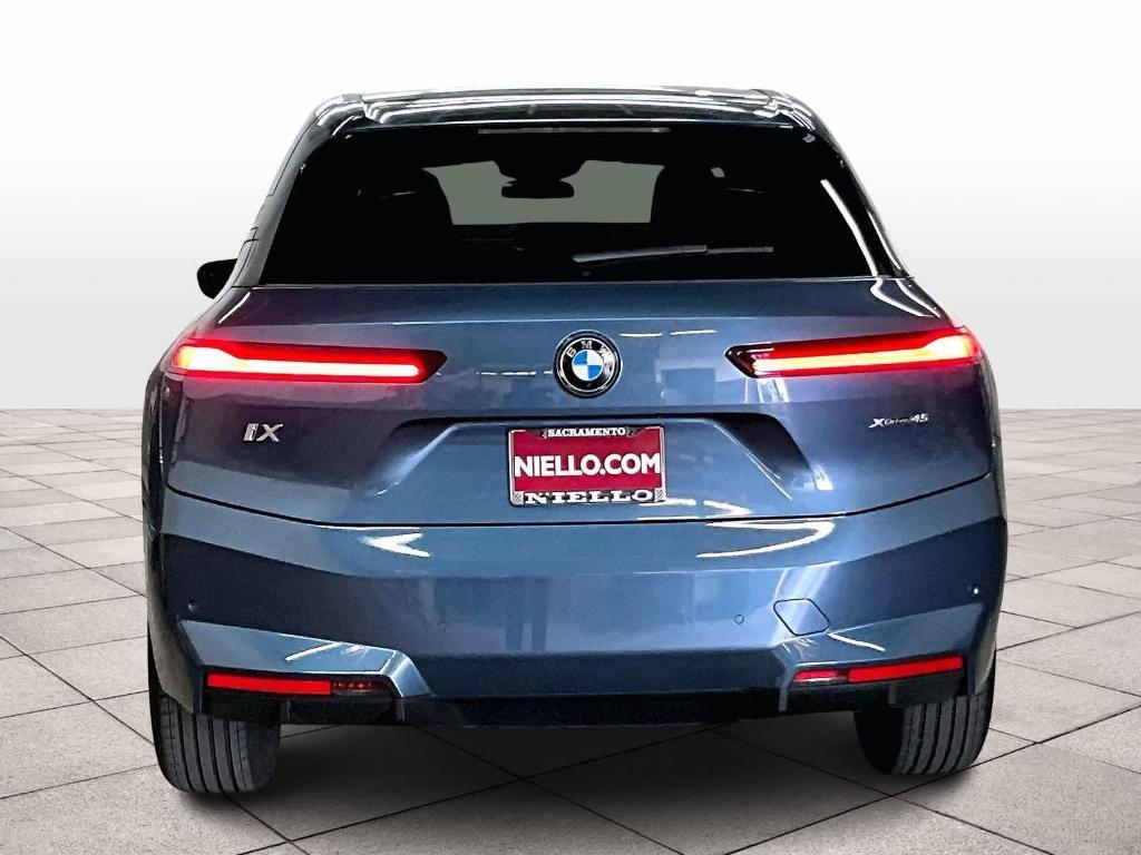new 2026 BMW iX car, priced at $85,595