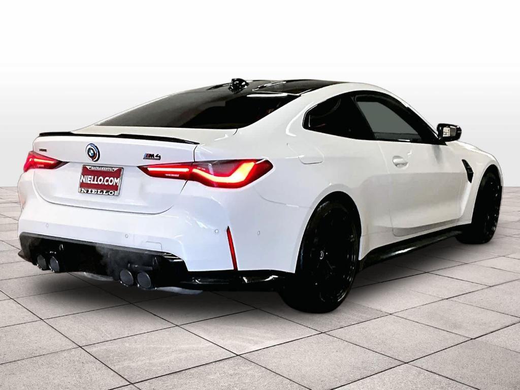 used 2023 BMW M4 car, priced at $76,393