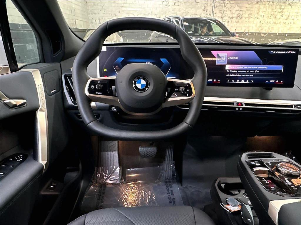 new 2026 BMW iX car, priced at $83,135