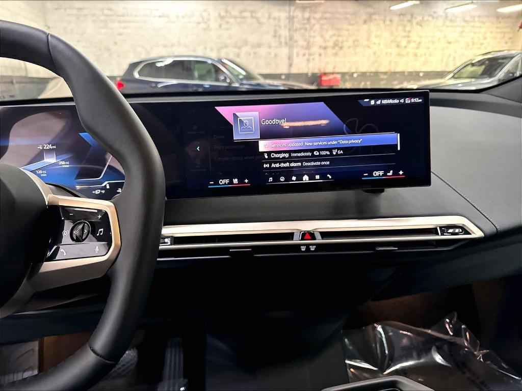 new 2026 BMW iX car, priced at $83,135