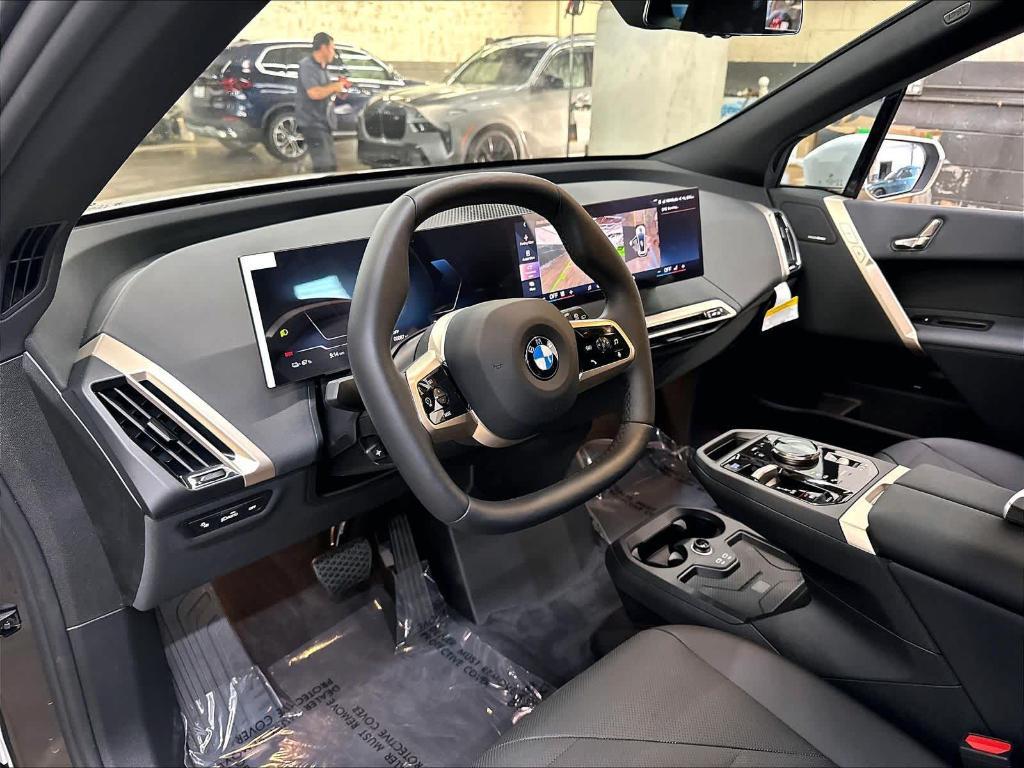 new 2026 BMW iX car, priced at $83,135