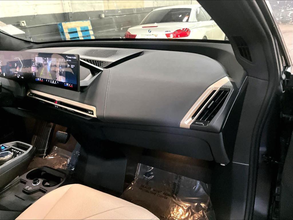 used 2025 BMW iX car, priced at $68,998