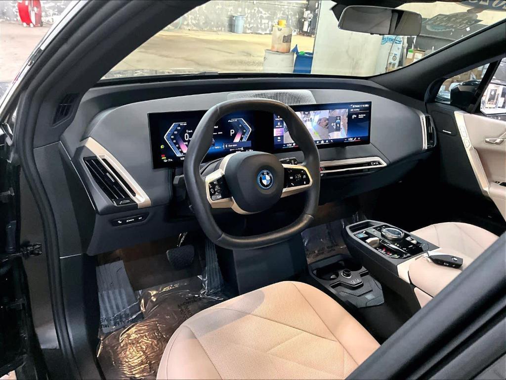 used 2025 BMW iX car, priced at $68,998