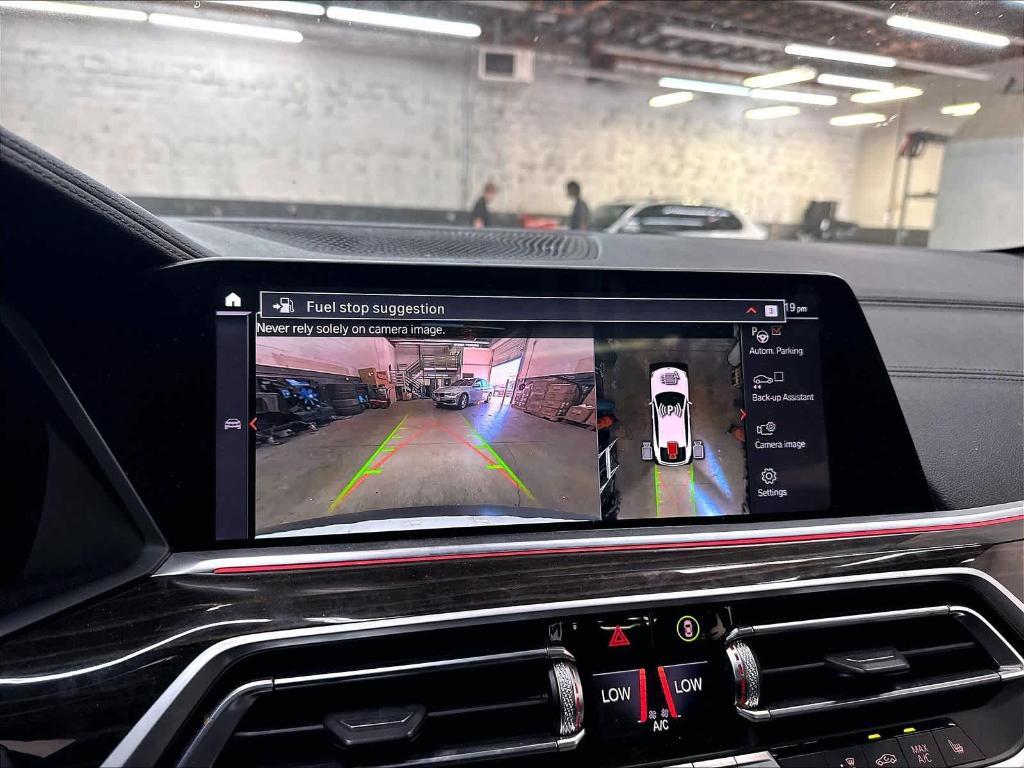 used 2023 BMW X6 car, priced at $55,079
