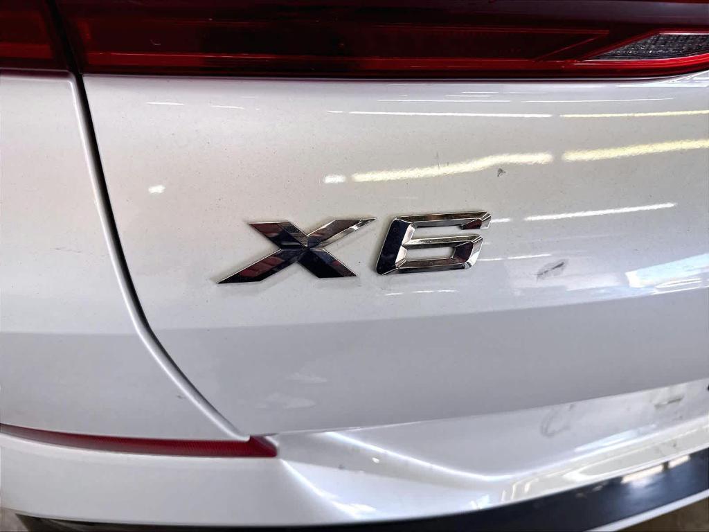 used 2023 BMW X6 car, priced at $55,079