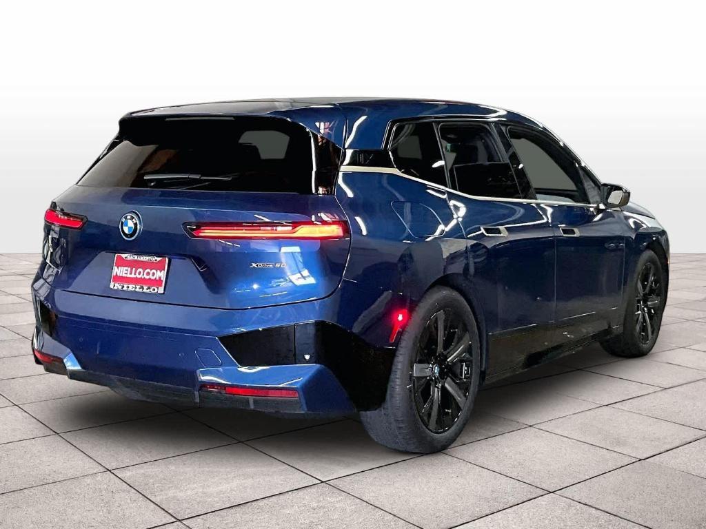 used 2025 BMW iX car, priced at $79,997