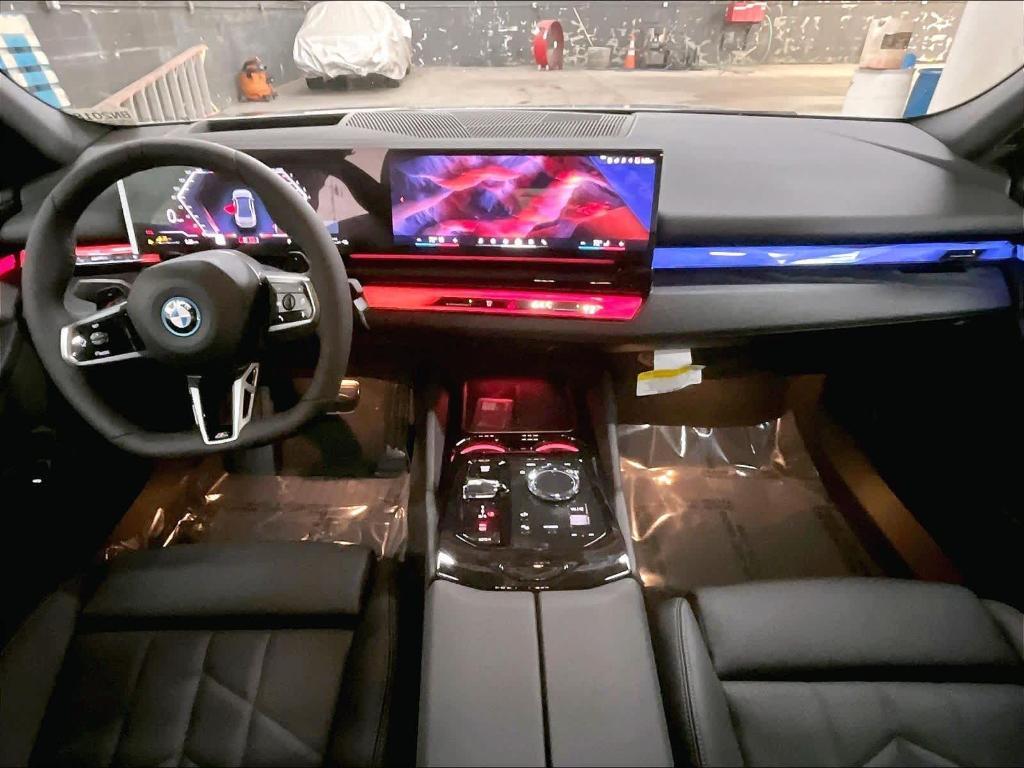 new 2026 BMW 550e car, priced at $85,050