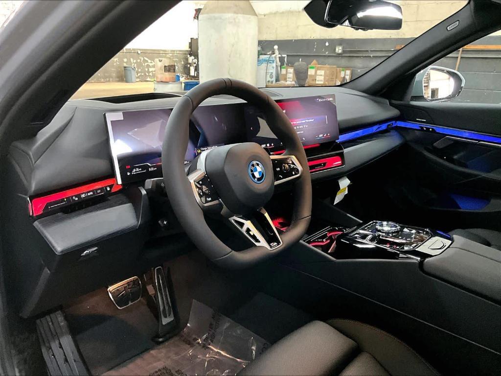 new 2026 BMW 550e car, priced at $85,050
