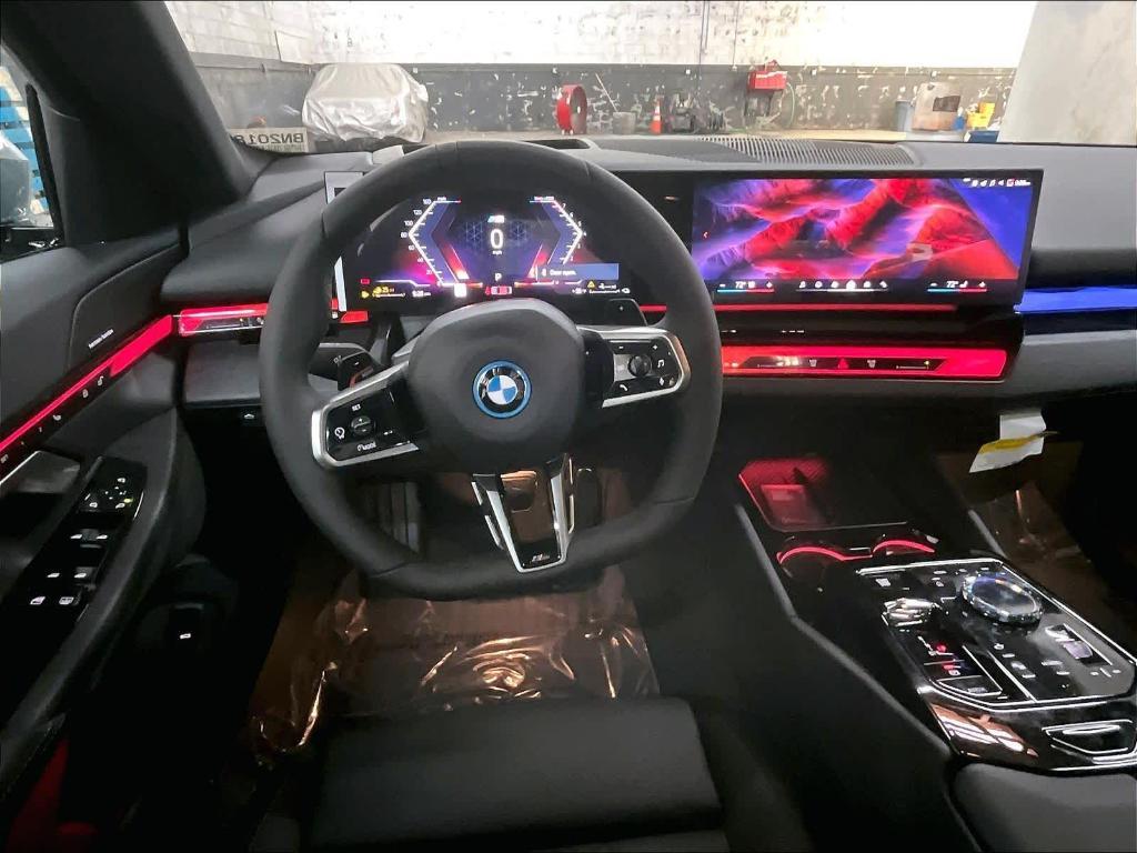new 2026 BMW 550e car, priced at $85,050