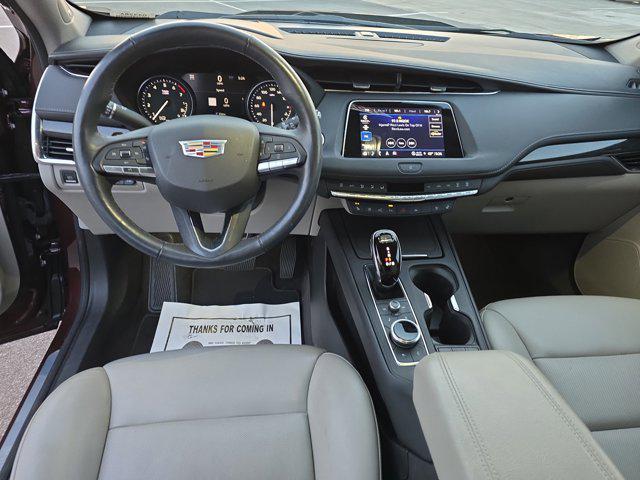 used 2023 Cadillac XT4 car, priced at $30,192