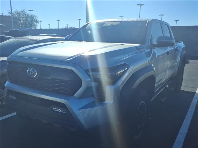 used 2025 Toyota Tacoma Hybrid car, priced at $49,636