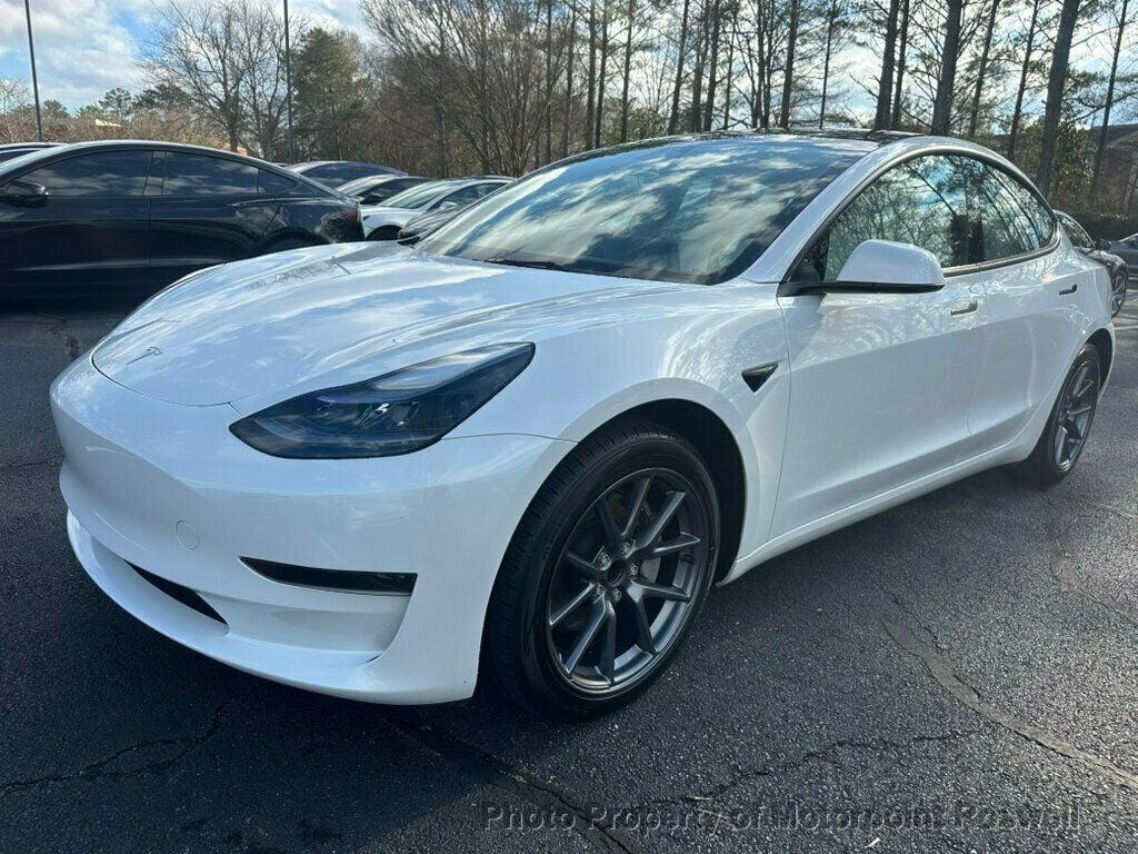 used 2023 Tesla Model 3 car, priced at $24,699