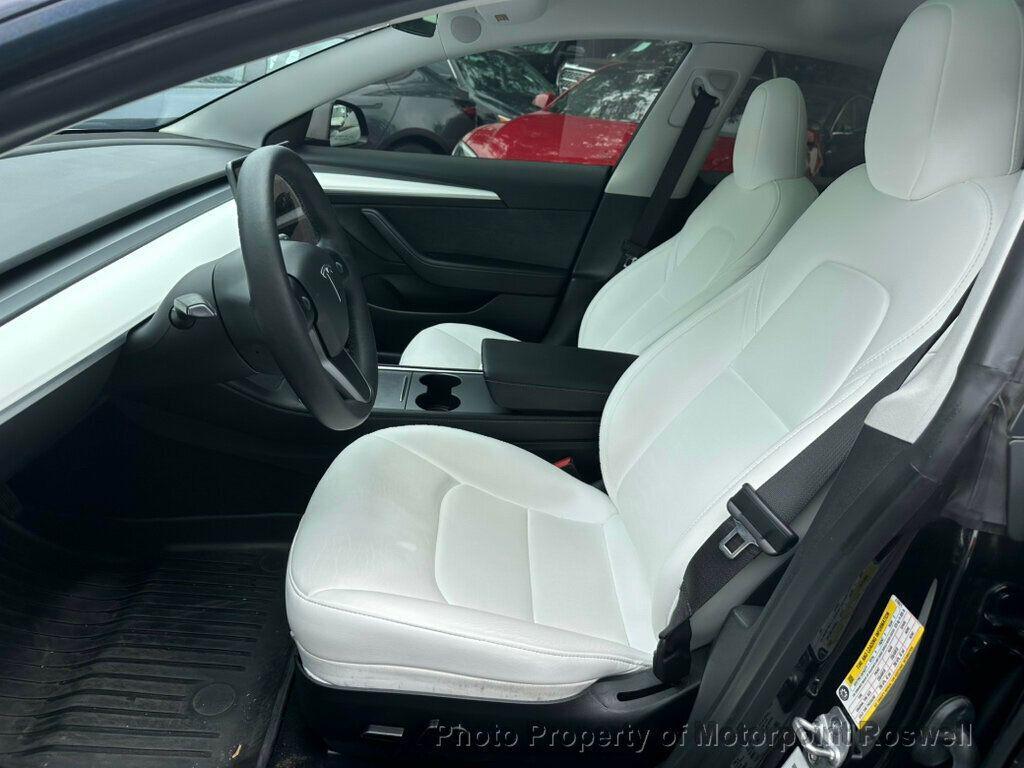 used 2023 Tesla Model 3 car, priced at $28,999