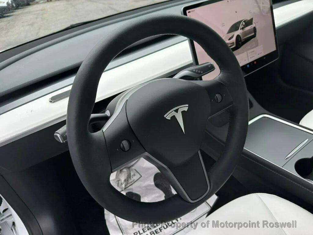 used 2023 Tesla Model 3 car, priced at $24,499