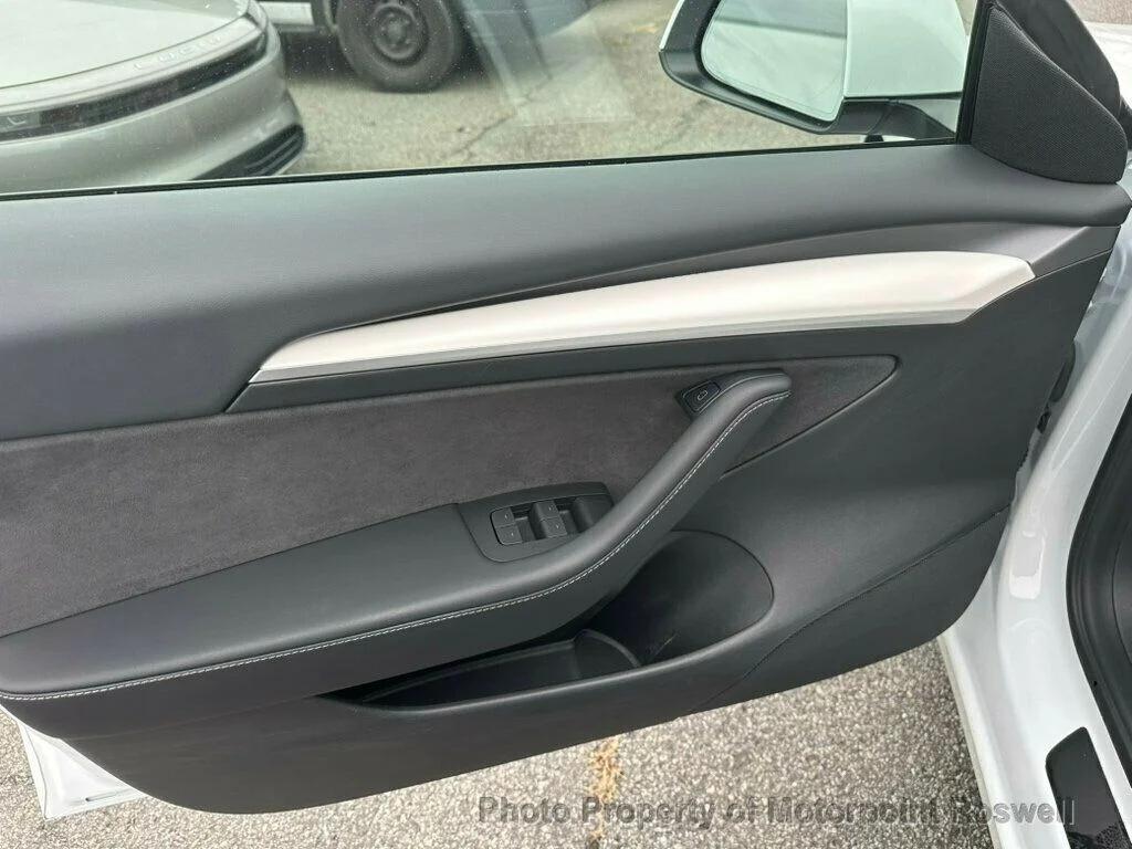 used 2023 Tesla Model 3 car, priced at $24,499