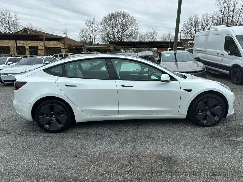 used 2023 Tesla Model 3 car, priced at $24,499