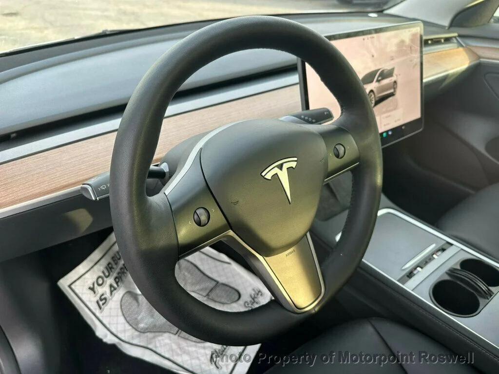 used 2023 Tesla Model 3 car, priced at $19,500