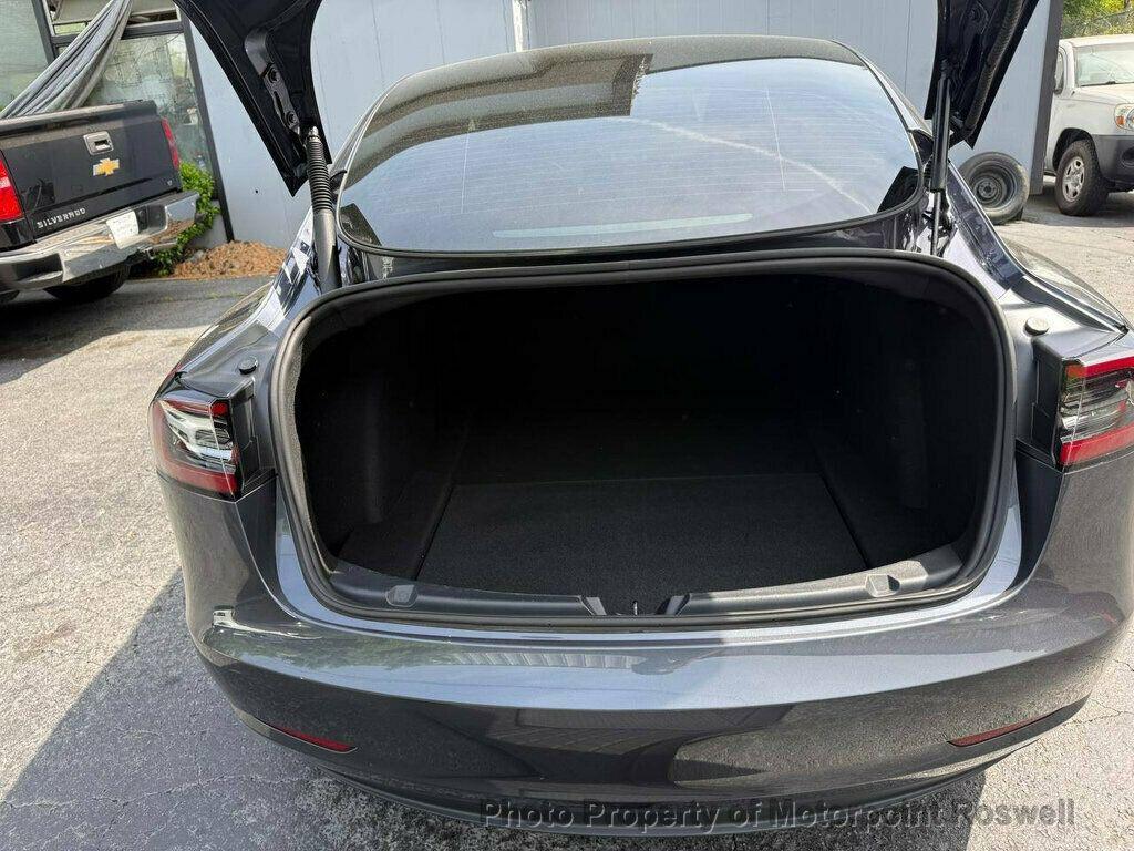 used 2023 Tesla Model 3 car, priced at $18,786