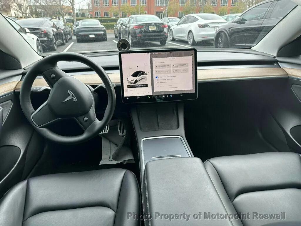 used 2023 Tesla Model 3 car, priced at $23,399