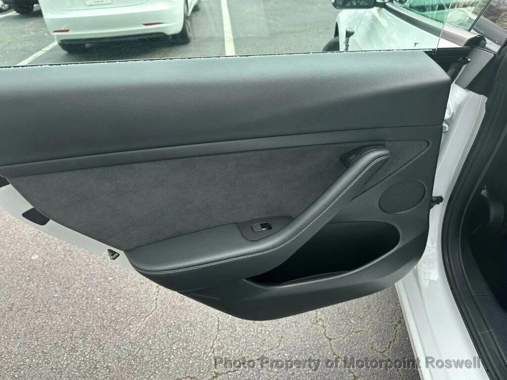 used 2023 Tesla Model 3 car, priced at $23,399