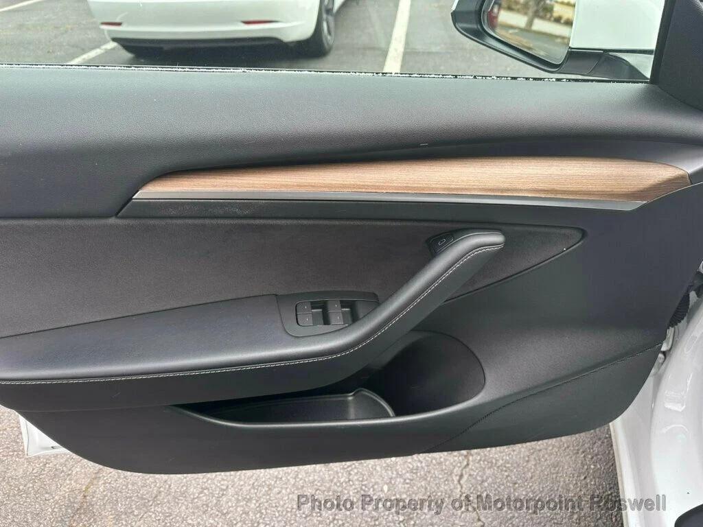 used 2023 Tesla Model 3 car, priced at $23,399