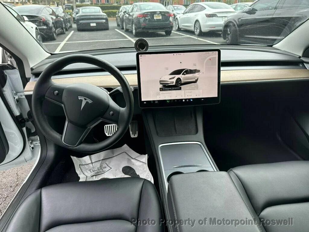 used 2023 Tesla Model 3 car, priced at $23,399