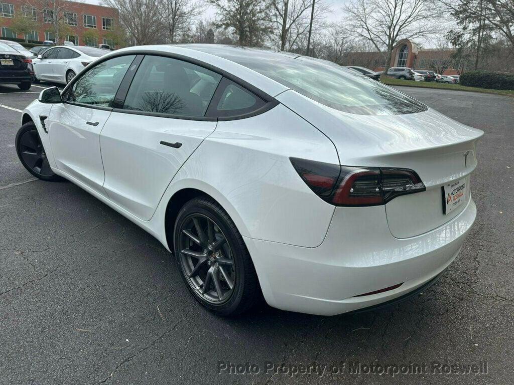 used 2023 Tesla Model 3 car, priced at $23,399