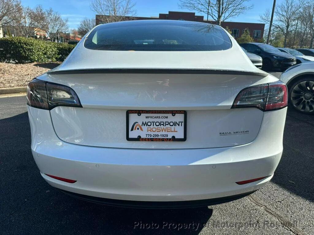 used 2022 Tesla Model 3 car, priced at $20,399