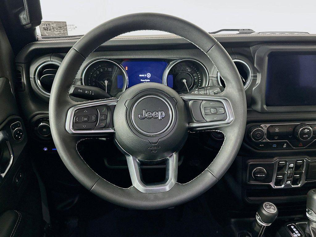 used 2023 Jeep Wrangler 4xe car, priced at $28,487