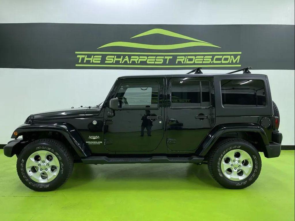 used 2014 Jeep Wrangler Unlimited car, priced at $15,500