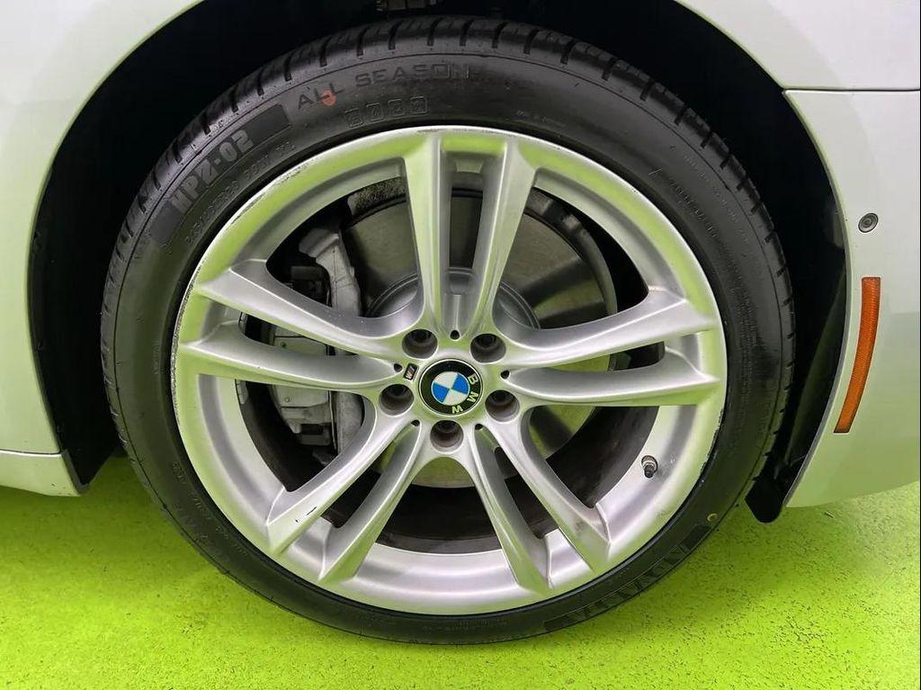 used 2015 BMW 750 car, priced at $17,988