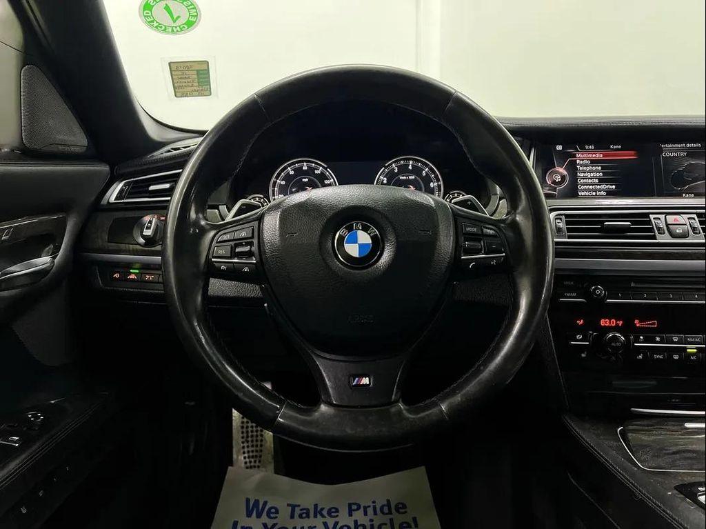used 2015 BMW 750 car, priced at $17,988