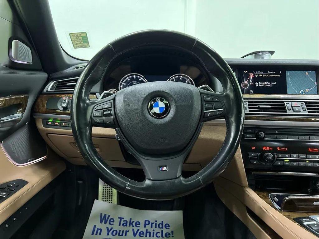 used 2015 BMW 750 car, priced at $17,988