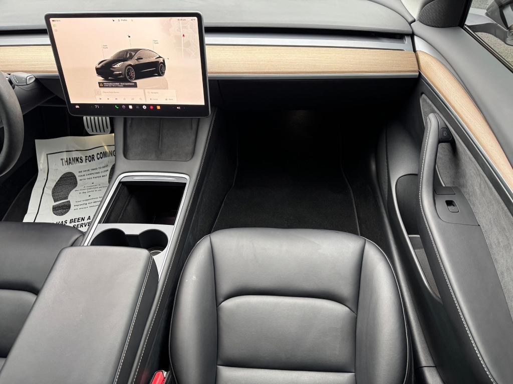 used 2023 Tesla Model 3 car, priced at $30,000