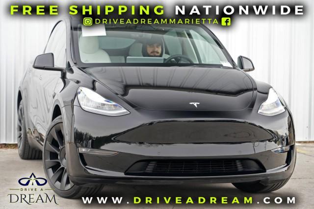 used 2022 Tesla Model Y car, priced at $23,000