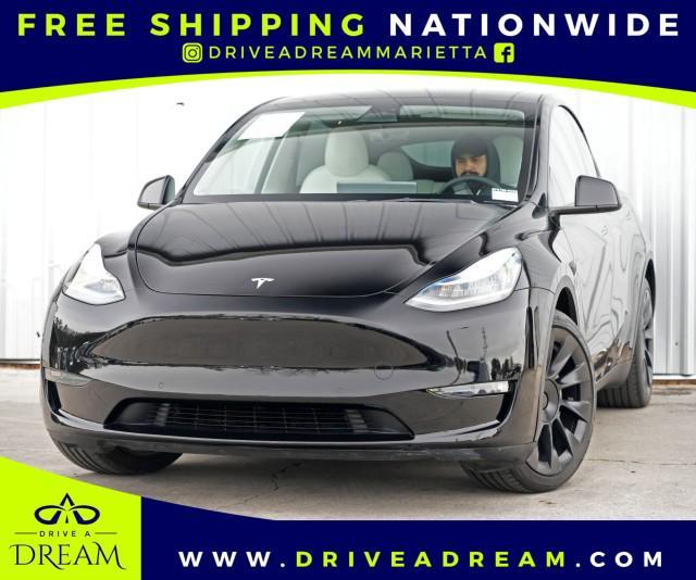 used 2022 Tesla Model Y car, priced at $23,000
