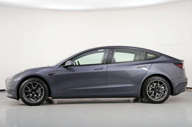 used 2023 Tesla Model 3 car, priced at $20,000