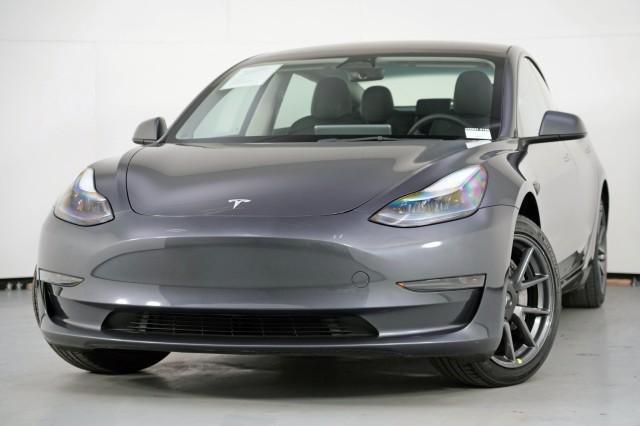 used 2023 Tesla Model 3 car, priced at $20,000
