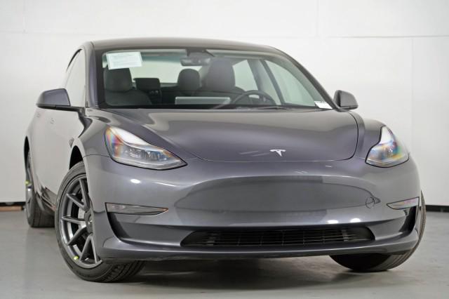 used 2023 Tesla Model 3 car, priced at $20,000