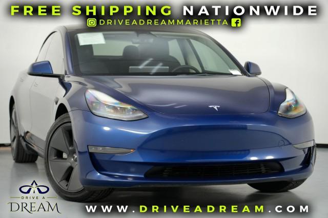 used 2023 Tesla Model 3 car, priced at $20,000