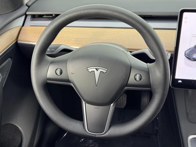 used 2023 Tesla Model Y car, priced at $27,000
