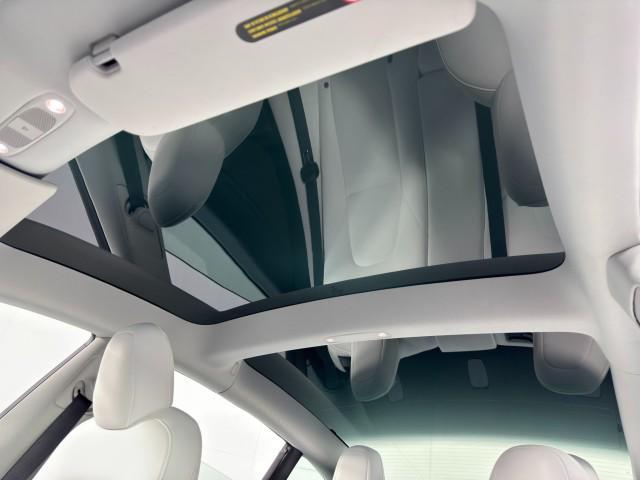 used 2021 Tesla Model 3 car, priced at $22,000