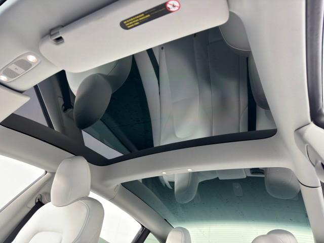 used 2022 Tesla Model 3 car, priced at $22,500